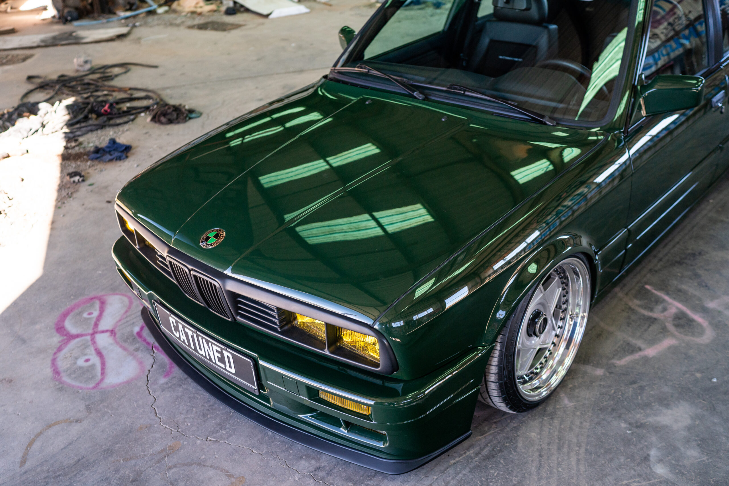 The Greenmaxhine BMW E30 Sedan by CAtuned