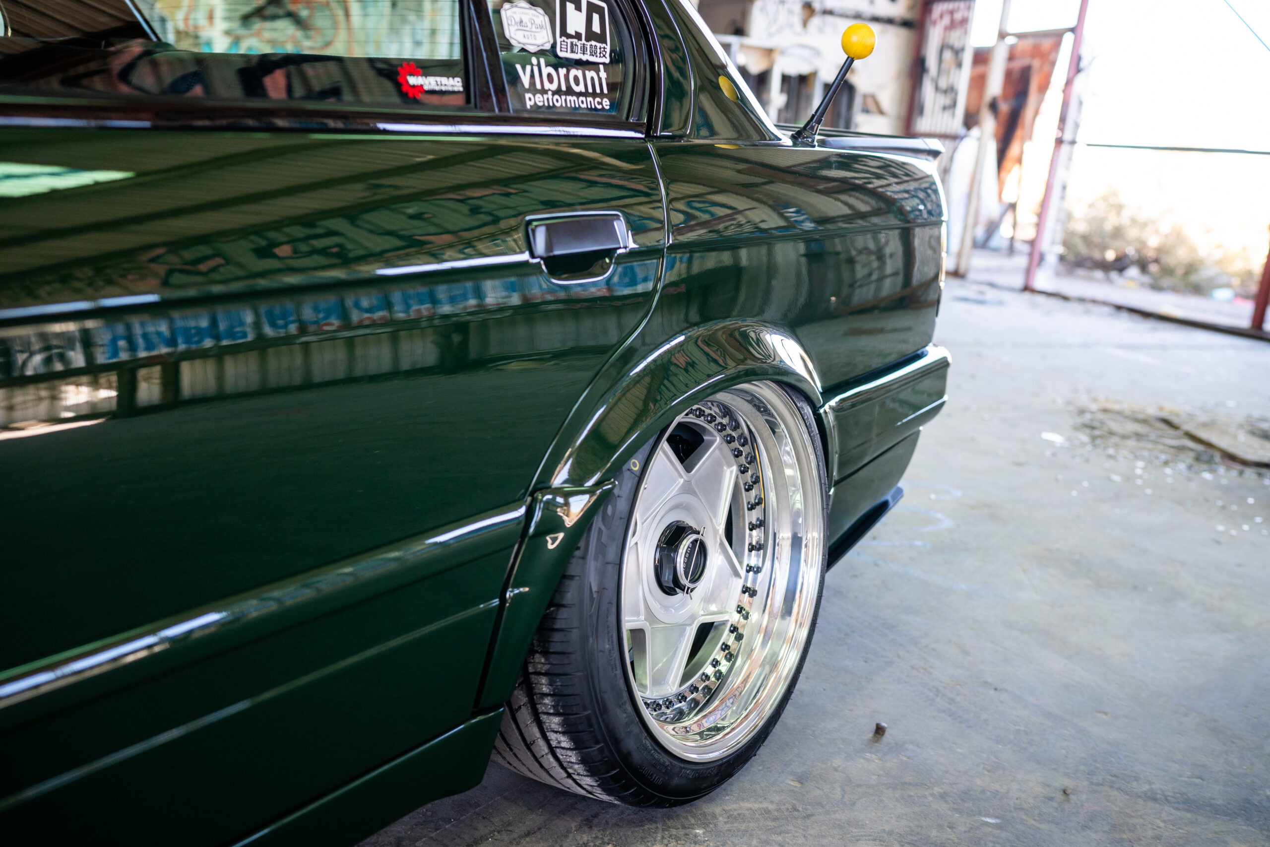 The Greenmaxhine BMW E30 Sedan by CAtuned