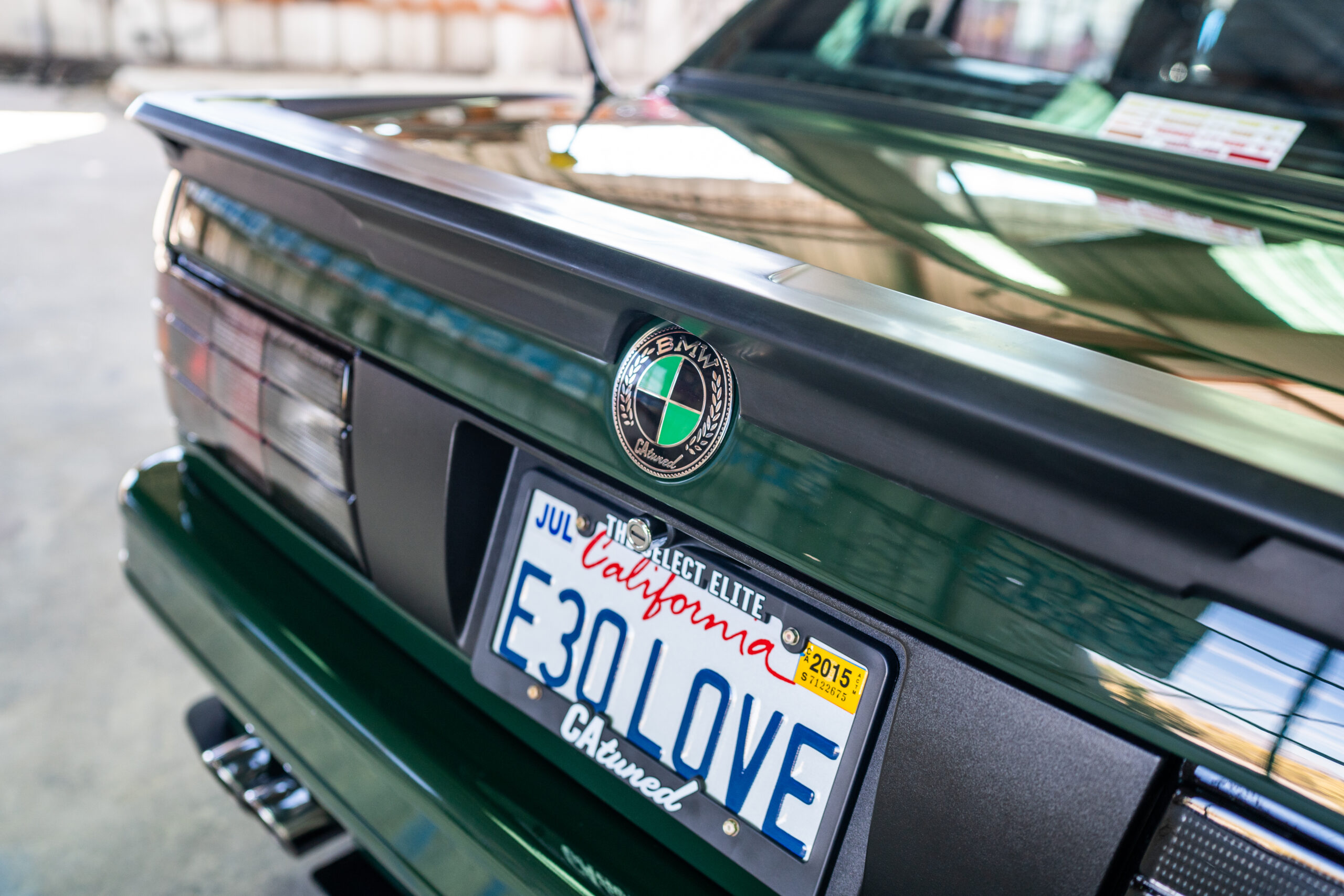 The Greenmaxhine BMW E30 Sedan by CAtuned