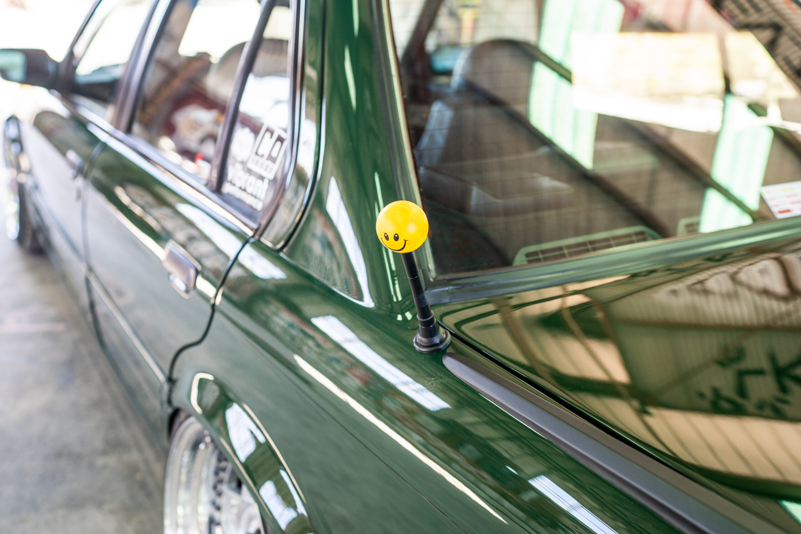 The Greenmaxhine BMW E30 Sedan by CAtuned