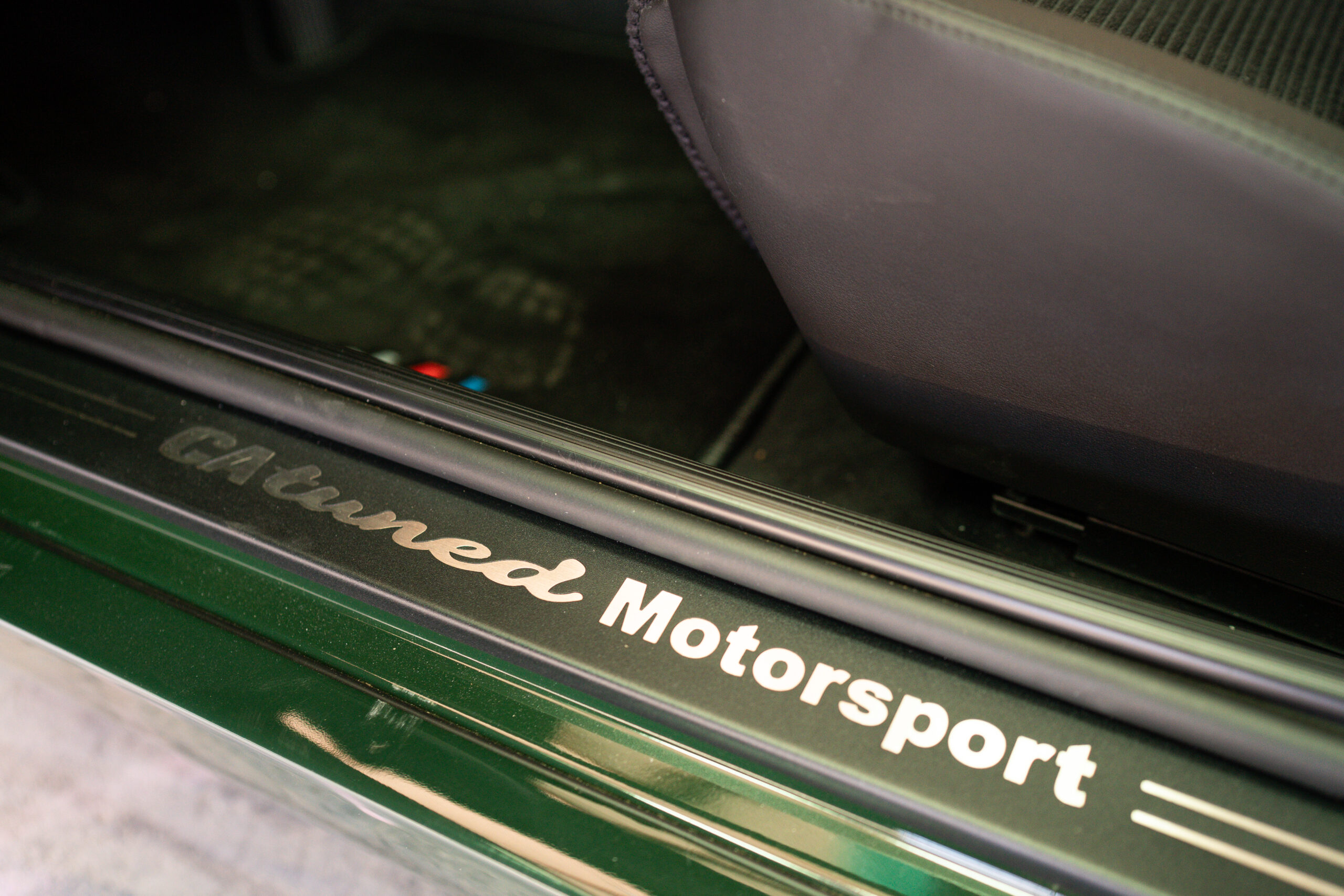 The Greenmaxhine BMW E30 Sedan by CAtuned