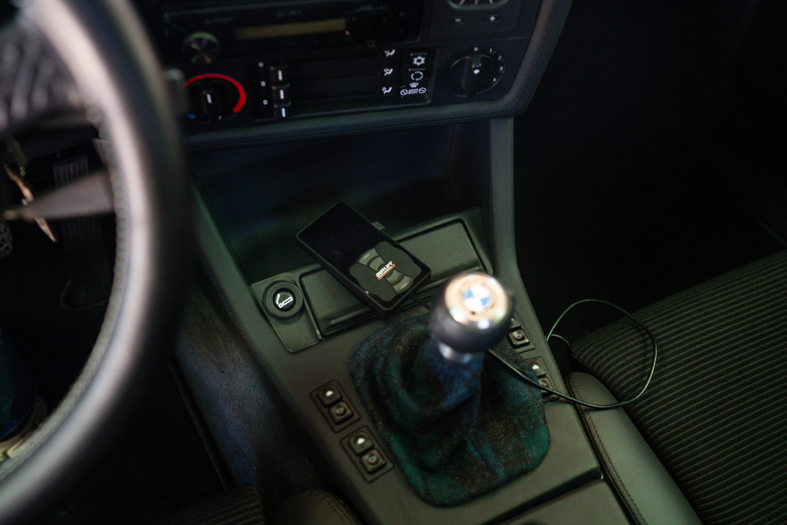 The Greenmaxhine BMW E30 Sedan by CAtuned