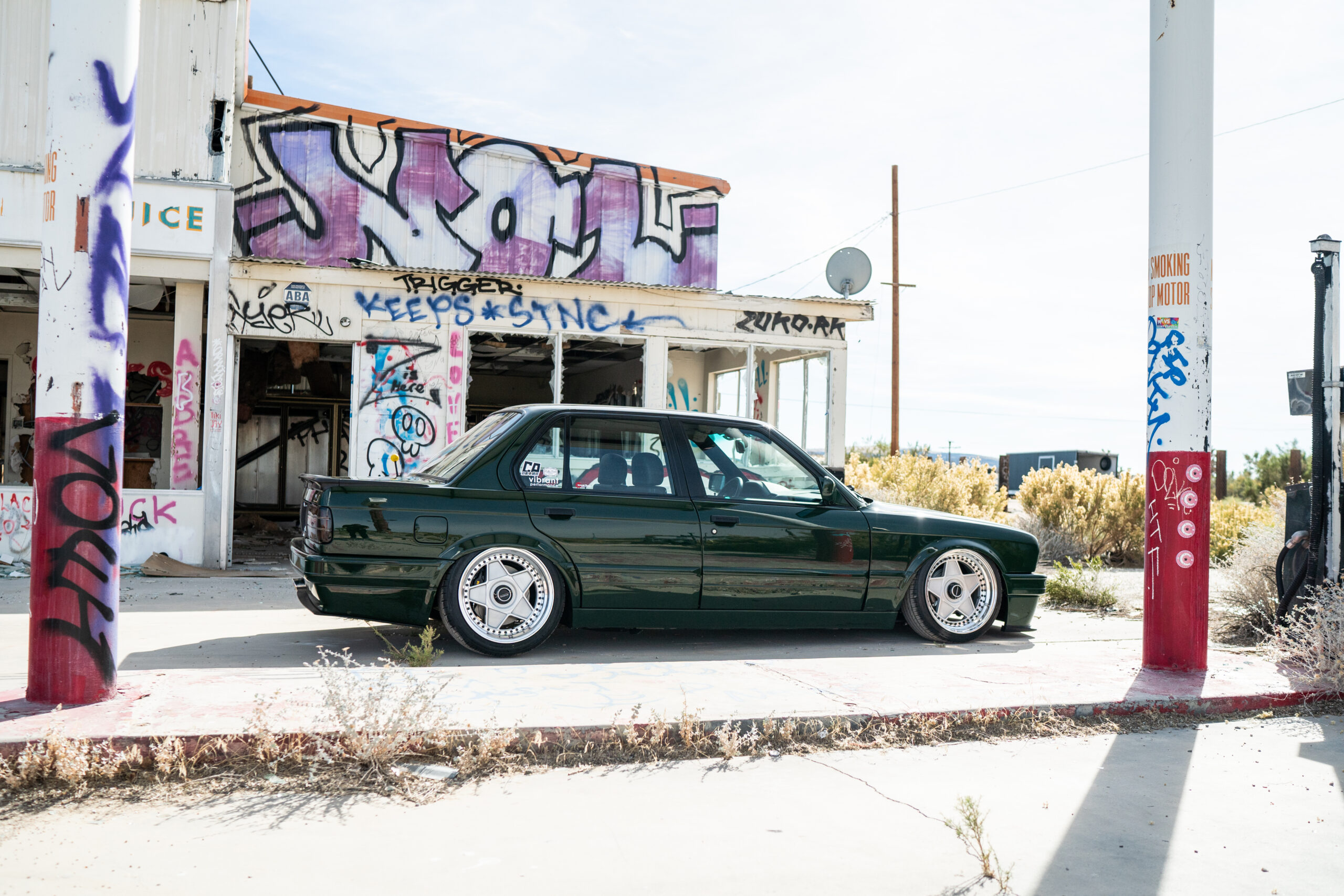 The Greenmaxhine BMW E30 Sedan by CAtuned
