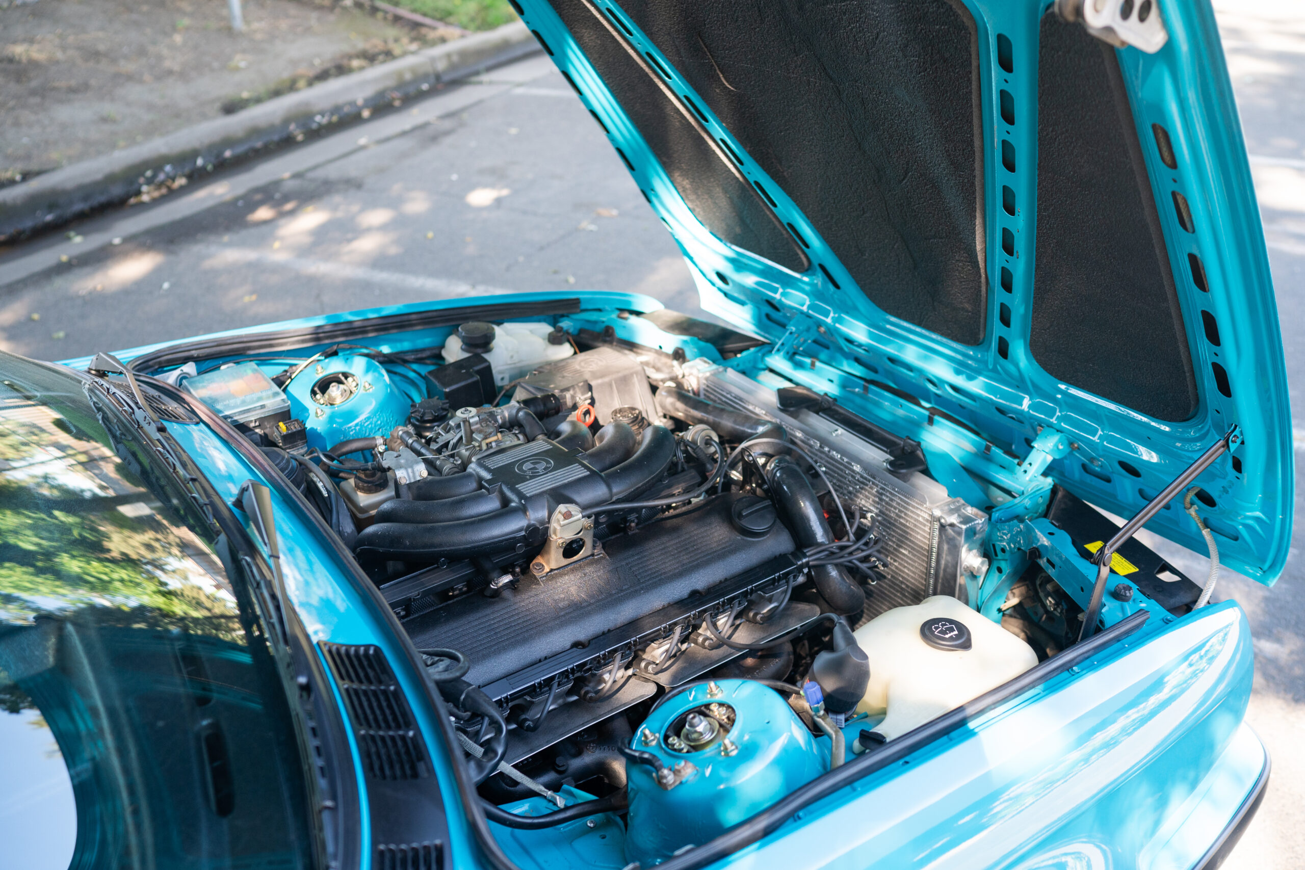 Miami Blue BMW E30 325is by CAtuned